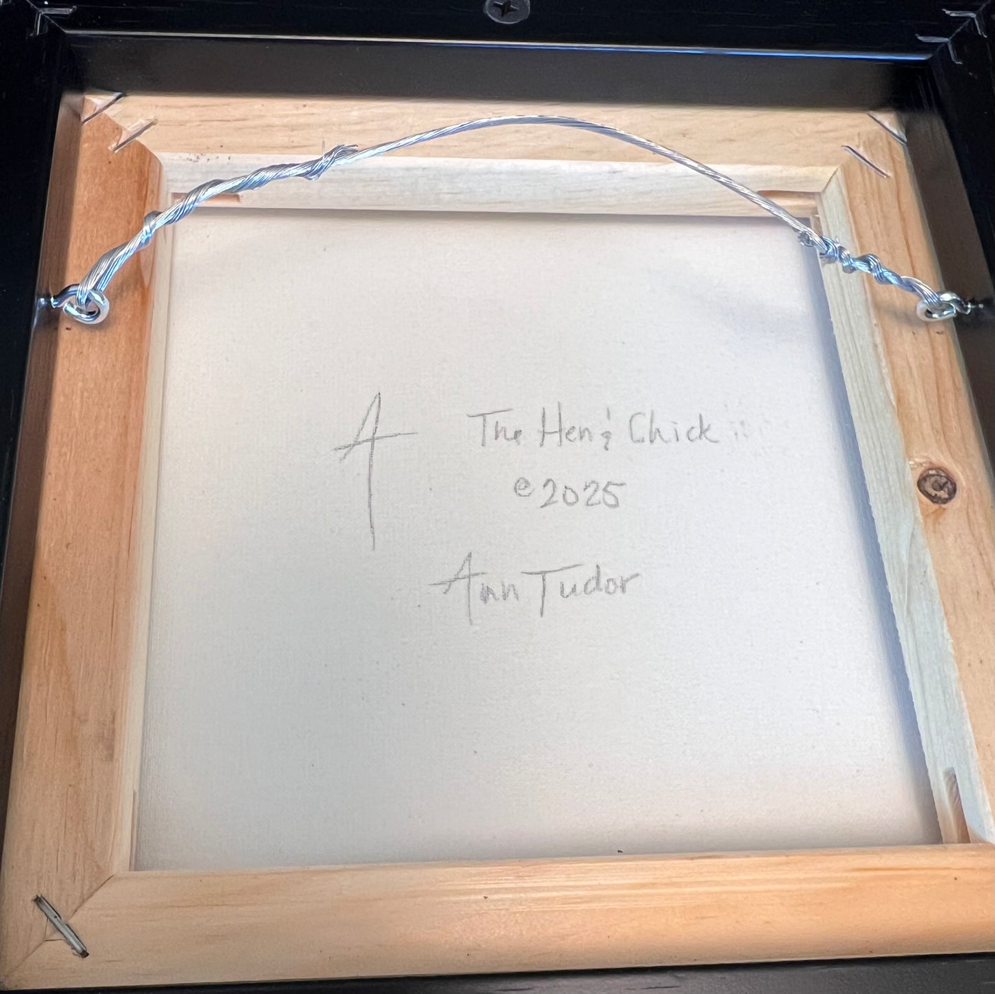 Back of The Hen & Chick painting with Signature of Ann Tudor and @2025