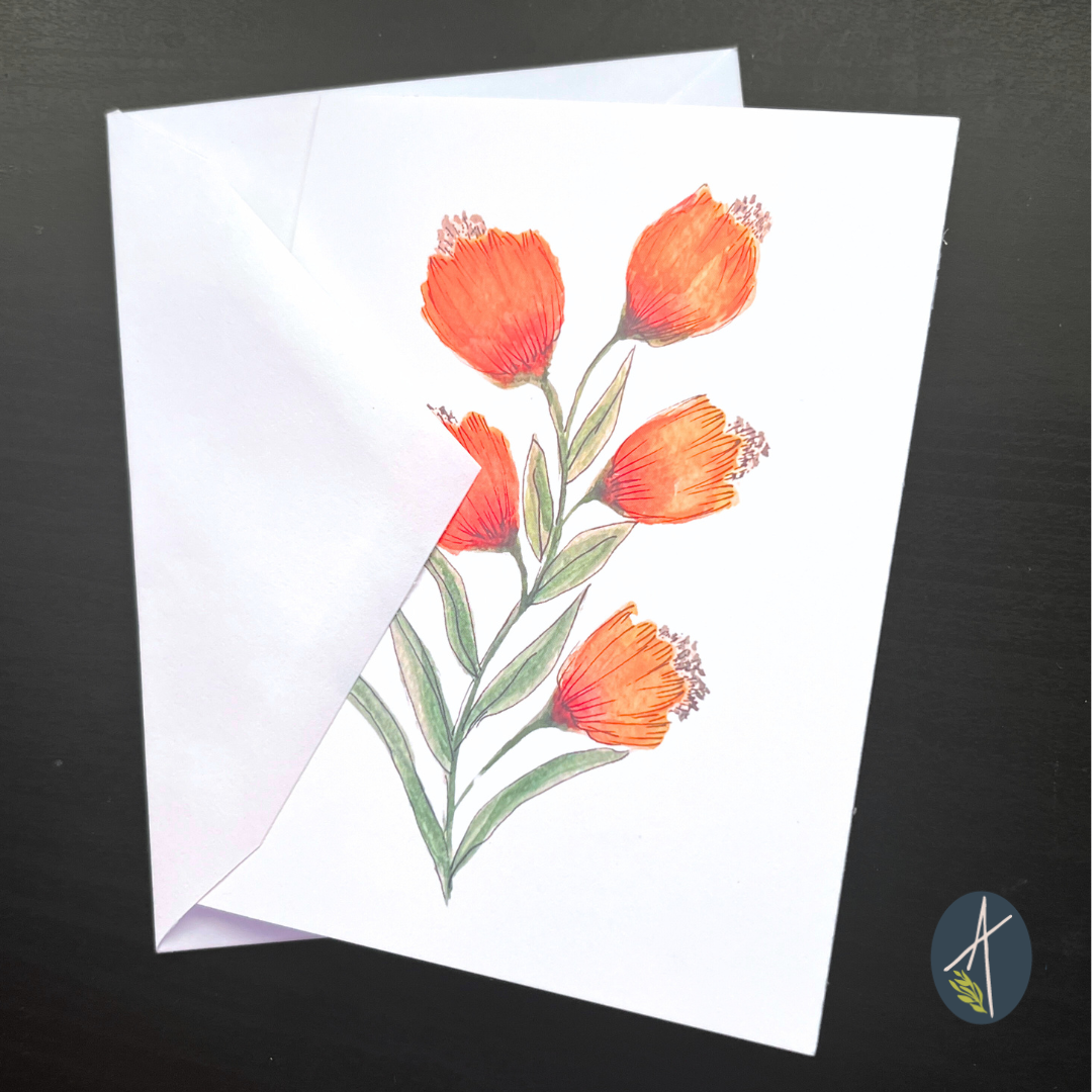 Stylized watercolor orange flowers on a notecard with envelope