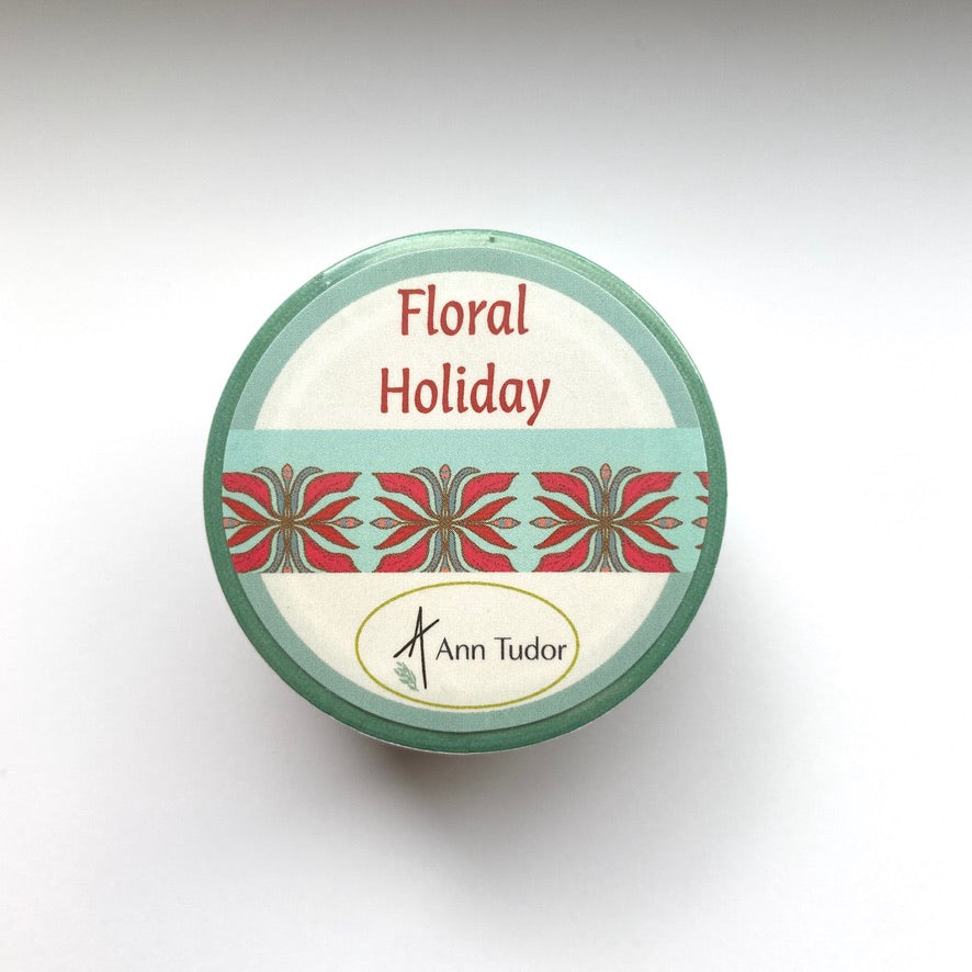 Washi tape with a red and dark turquoise art deco design on light turquoise background