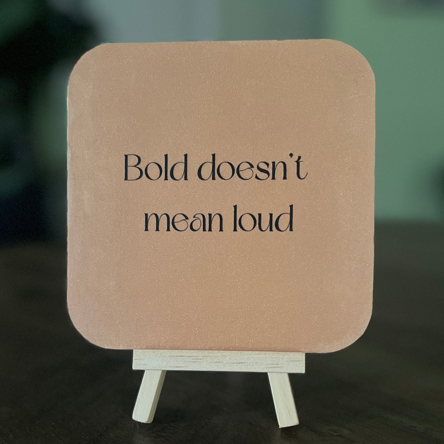 Meaningful 5x5 art board featuring Muriel and her message ‘Bold doesn't mean loud.’ A thoughtful art gift with a mini easel included