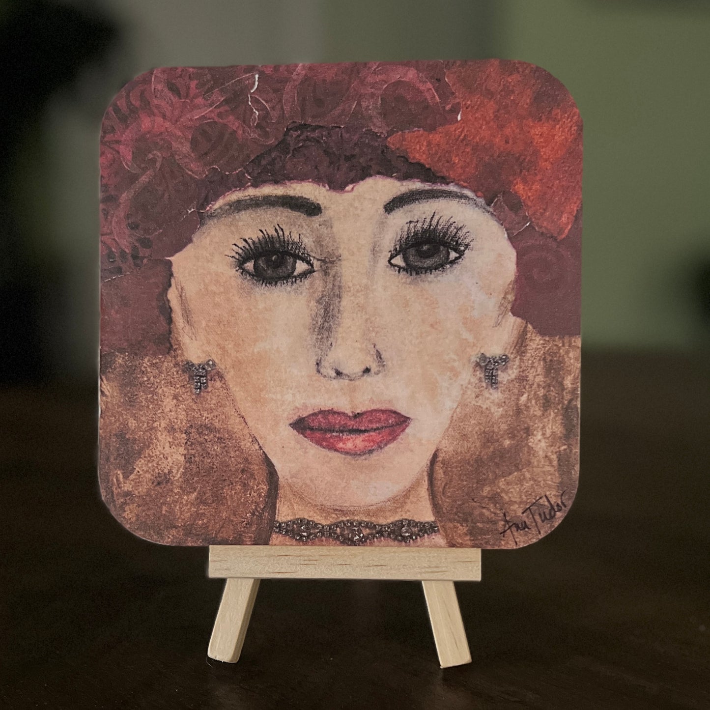 Dorothy is a 5x5 mixed-media art board from the Women + Words series — a collectible piece with a hidden message and mini easel