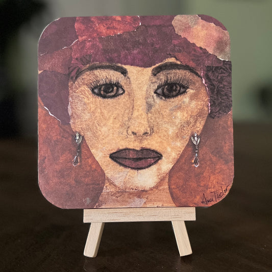 Esther is a 5x5 mixed-media art board from the Women + Words series — a collectible piece with a hidden message and mini easel